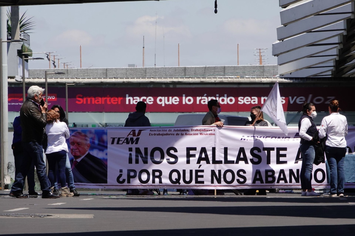 AICM Trabajadores Mexicana cuartoscr