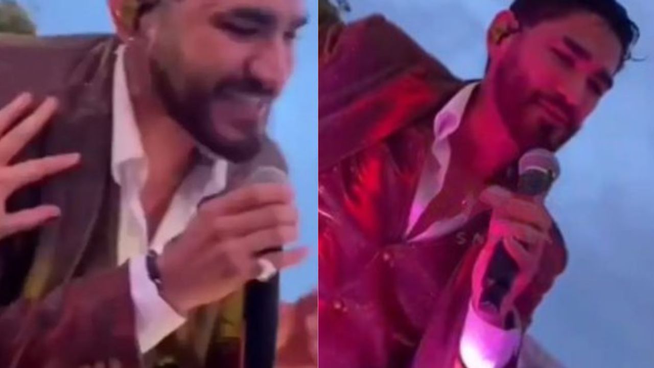 Fan acosa al vocalista de la Banda El Recodo en pleno show