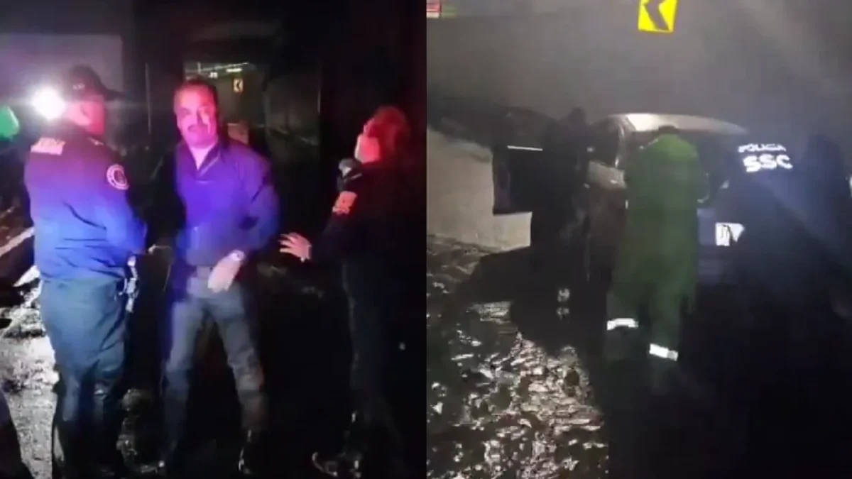 Autoridades capitalinas rescatan a conductor varado en el bajopuente de Periférico.